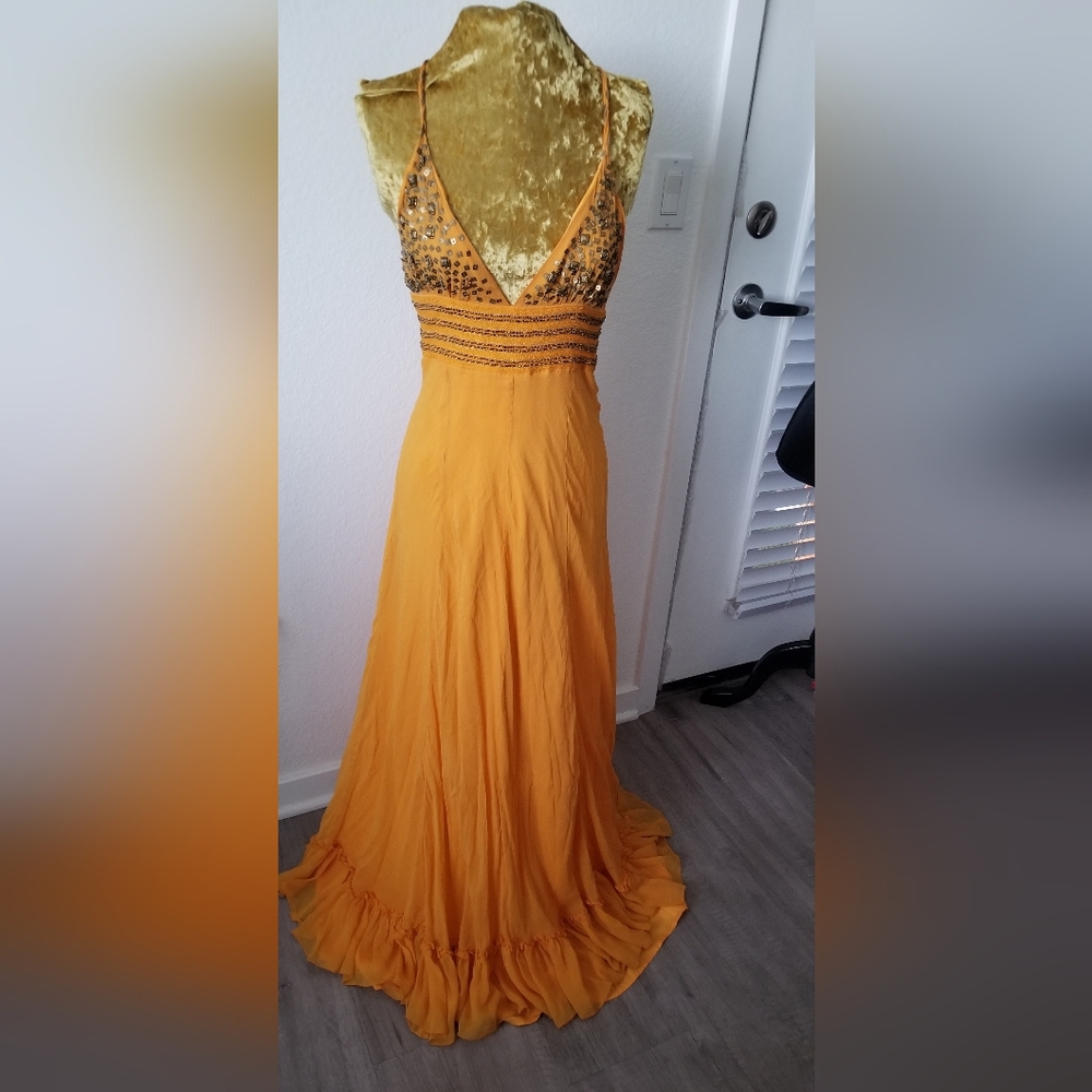 Silk summer dresses with beaded bust.